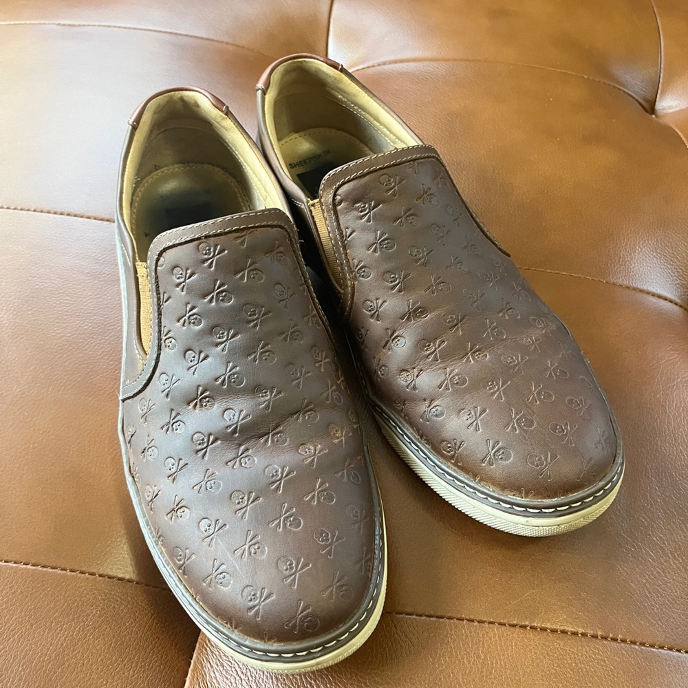 J&M McGuffey skull-embossed brown slipons